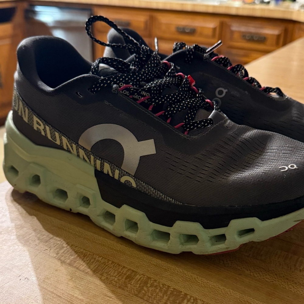 On Running Black and Mint Athletic Shoes